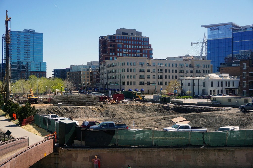 Crews work on the upcoming Confluence apartment building. Photo by Burl Rolett.