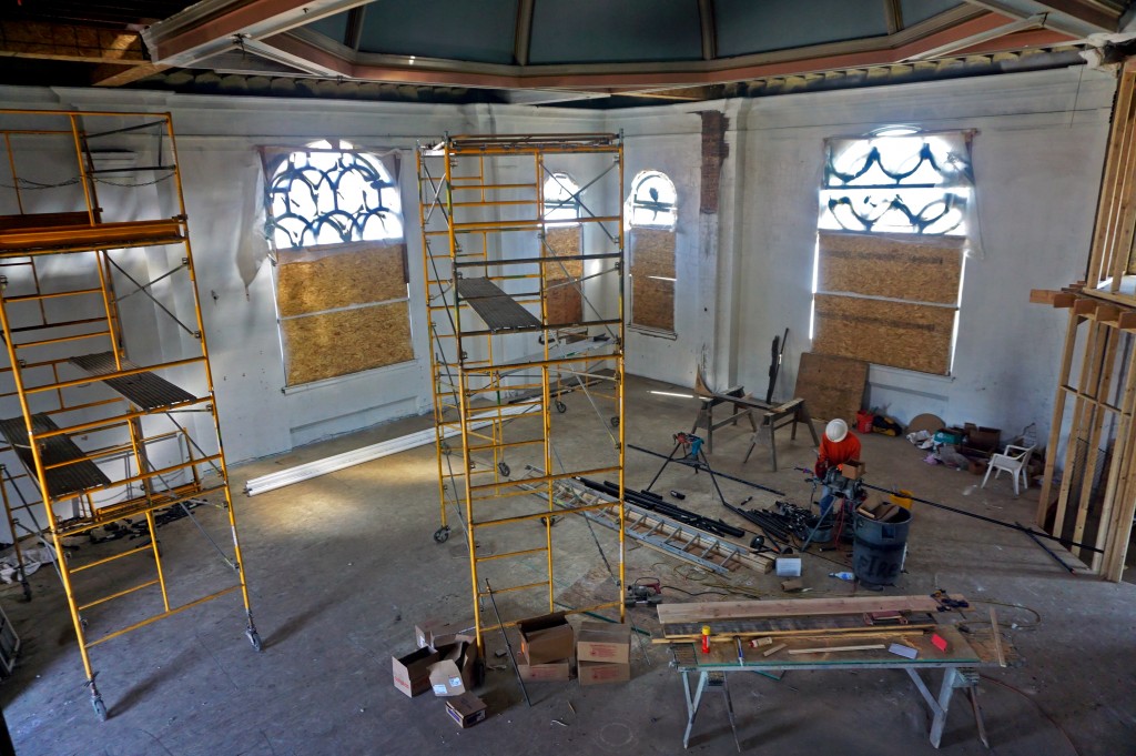 Crews work on the Epworth Church building, which will soon house offices and a restaurant. Photos by Burl Rolett.