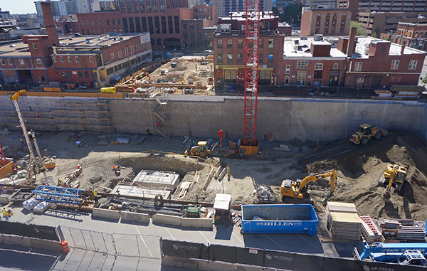 A new mixed-use project has dug up a block of Street. Photo by Burl Rolett.