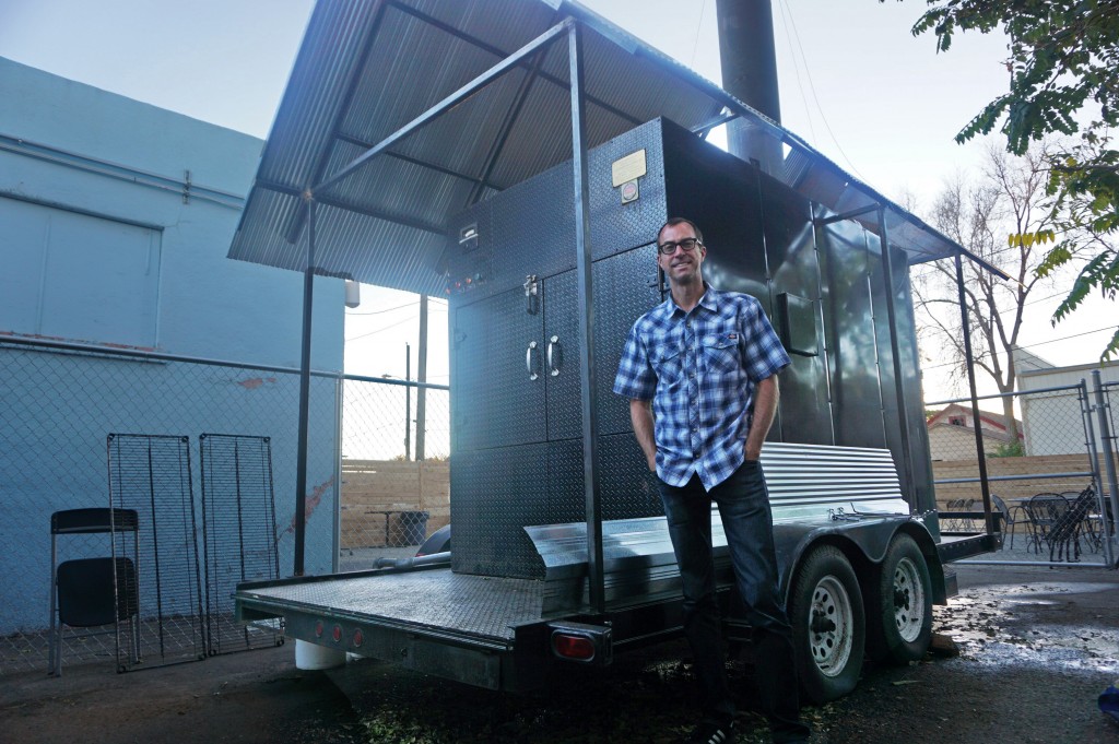Jeff Cornelius in front of his large Texas smoker. Photos by George Demopoulos.