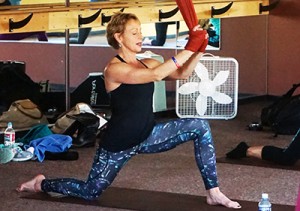 Rebecca Kirschner teaching an Aireal Yoga Class class. 