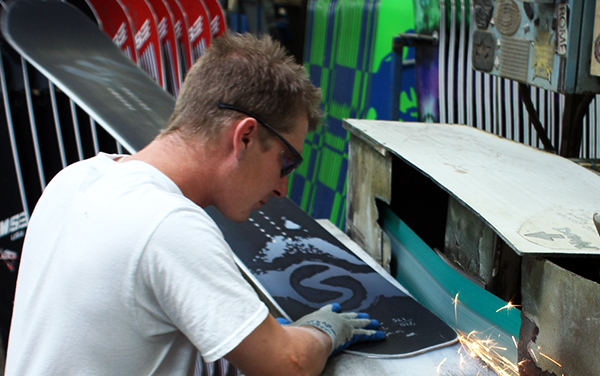 A sims snowboard in production at Never Summer factory. 