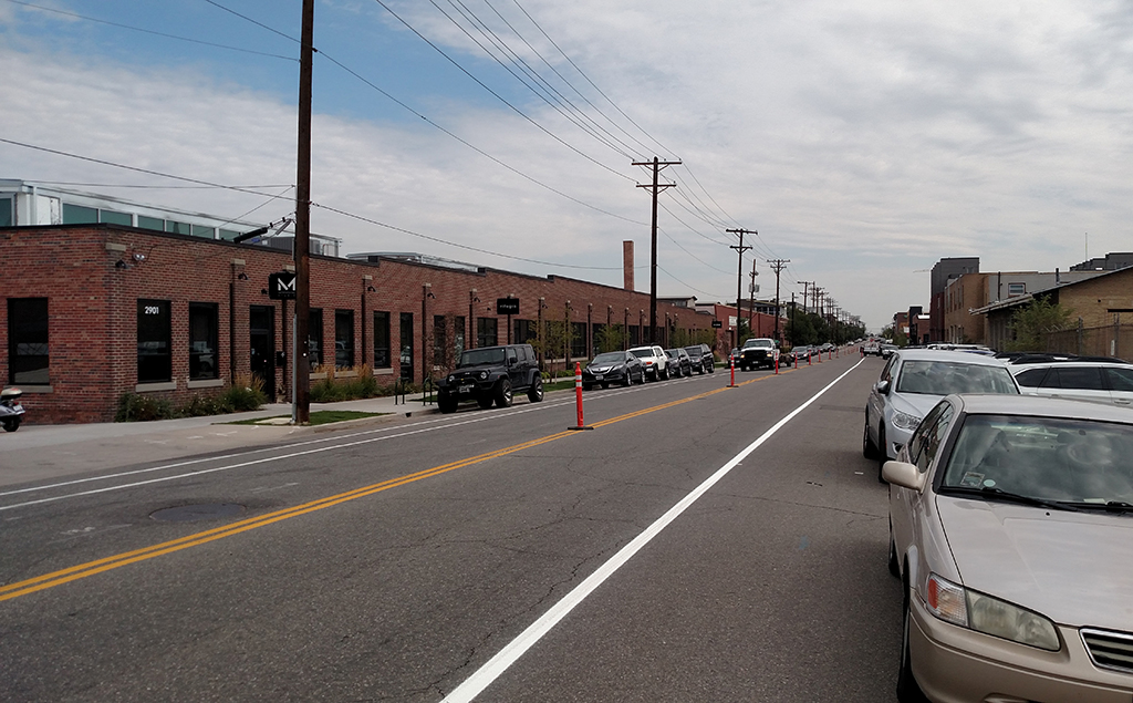 A lane was closed on Blake Street to add new yellow lines and a bike lane. (Burl Rolett)
