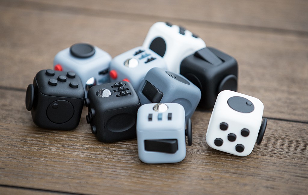 The Fidget Cube is a desk toy with different switches, buttons and wheels on each of its six sides. (Courtesy Antsy Labs)