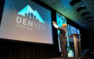 Mayor Michael Hancock takes a selfie with the crowd at a breakfast kicking off Denver Startup Week. (Amy DiPierro)