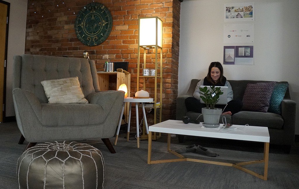A MeetMindful employee sits in the firm's new office space. (Amy DiPierro)