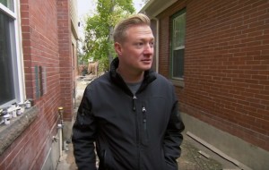 Nylund outside the home as renovations continued. (DIY Network)